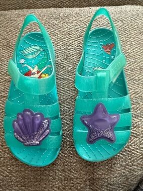 CROCS Teal Jelly Sandals with Purple Shell & Star Charms